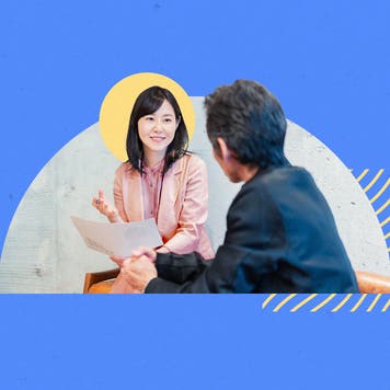 A young woman talking to a financial therapist