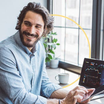 Happy man at laptop