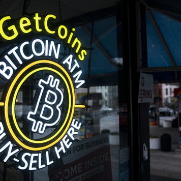 A sign for a Bitcoin automated teller machine