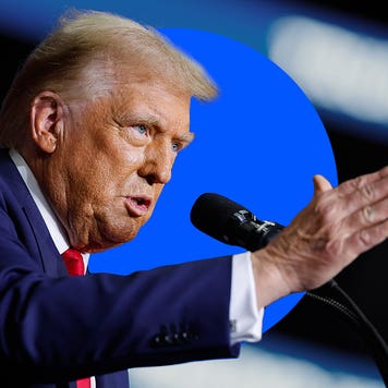 Donald Trump speaking into a microphone.