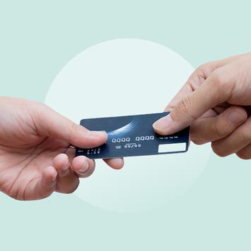 Two people sharing a credit card