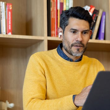 businessman in a virtual meeting at a coworking office
