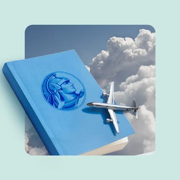 design element including an airplane flying over a book in the sky