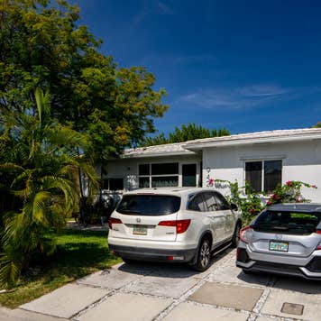 two cars in a Florida driveway