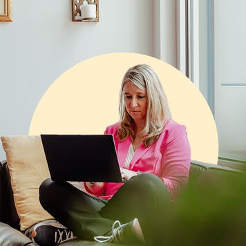 Karen Bennett working on a laptop