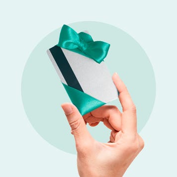 Illustration of a gift card wrapped in ribbon