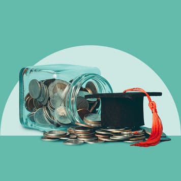 A jar of coins on its side spilled over with a graduation cap perched on top of the coins