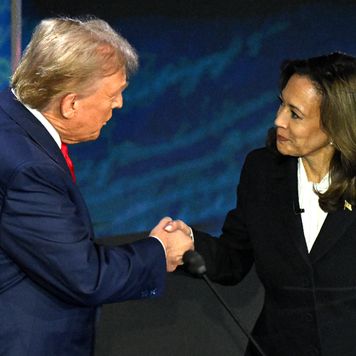 US Vice President and Democratic presidential candidate Kamala Harris shakes hands with former US President and Republican presidential candidate Donald Trump during a presidential debate.