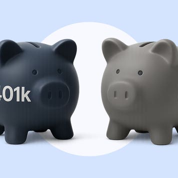 A gray piggy bank labeled IRA faces a black piggy bank labeled 401(k) on a blue background.