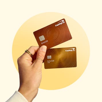 Hand holding Savor and SavorOne cards