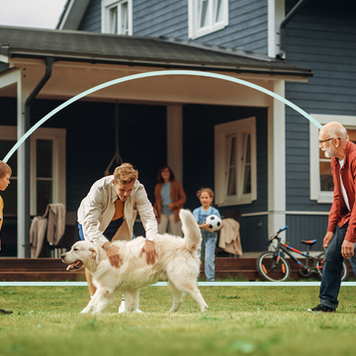 family in front of home