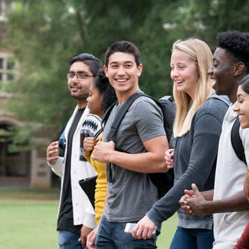 New Friends Walking on University Campus
