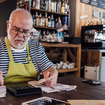 A small business owner working on their taxes.