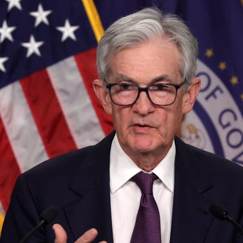 Fed chair Jerome Powell speaks to reporters at a Fed meeting