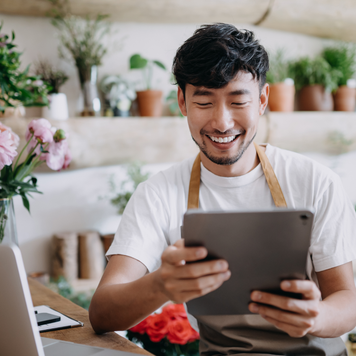 A small business owner reviewing important documents.