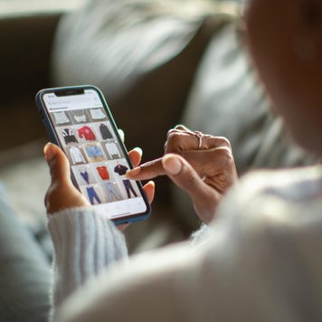 Woman purchasing clothes on a mobile app