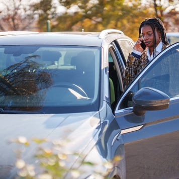 Person getting into car