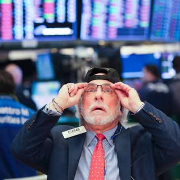 A trader works at the New York Stock Exchange in New York