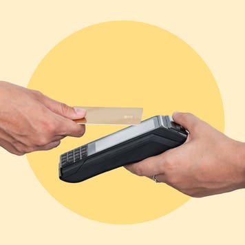 Design element displaying someone paying with a credit card