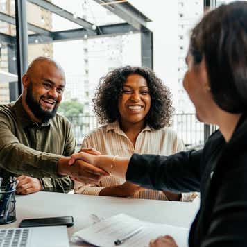 Couple meeting with a financial advisor.