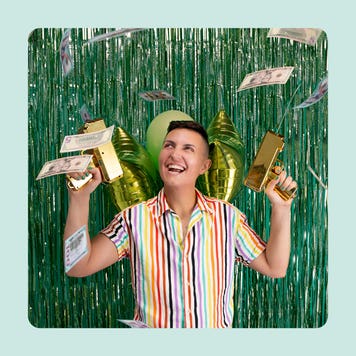 business owner celebrating with money in the air