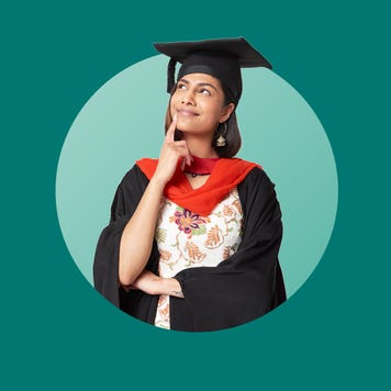 Female college graduate in cap and gown thinking about something