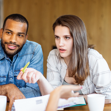 Young couple planning their finances together.
