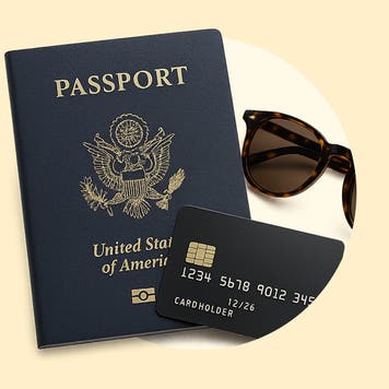 A passport, credit card, and sunglasses surrounded by a yellow background.