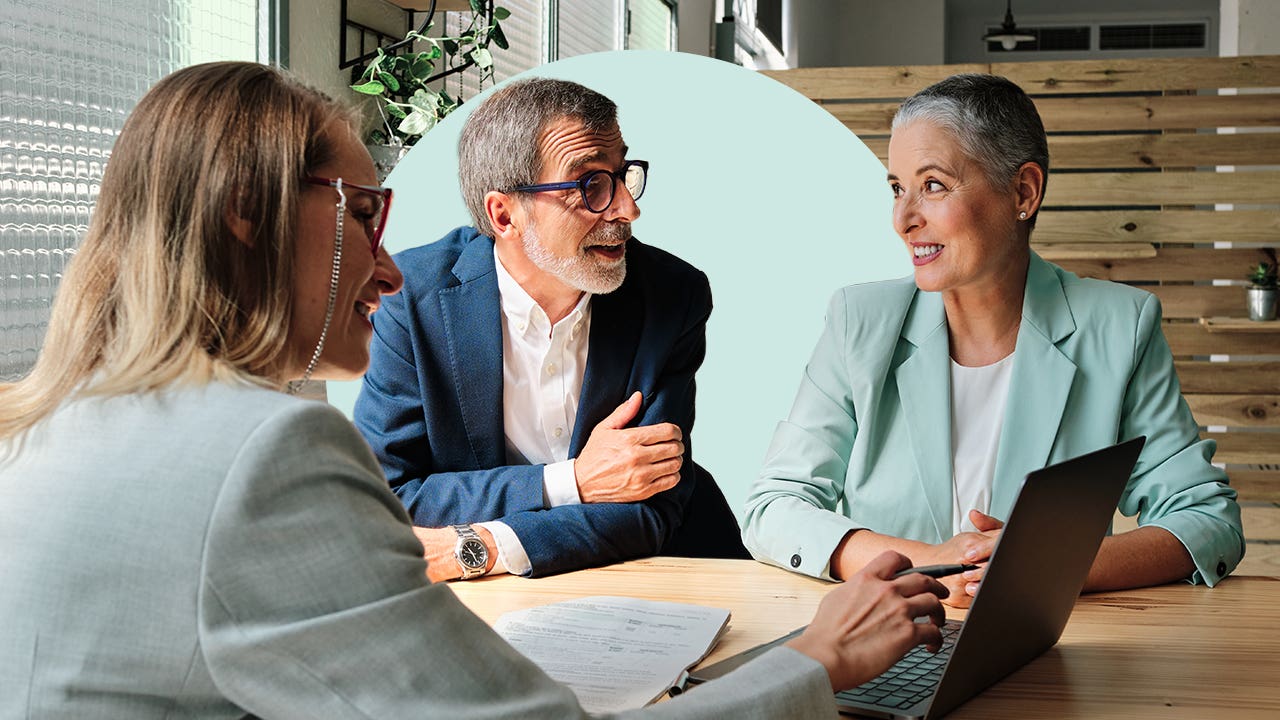 Financial advisor meeting with clients.