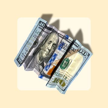 A hundred dollar bill folded accordion style on a yellow background.