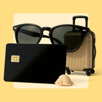summer travel essentials like sunglasses, credit card and luggage