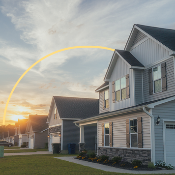 suburban homes with illustrated yellow sun in sky