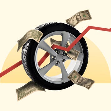 A tire with money and a chart in the background