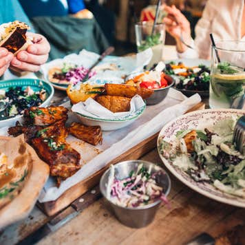 A closeup of food spread on a restaurant table