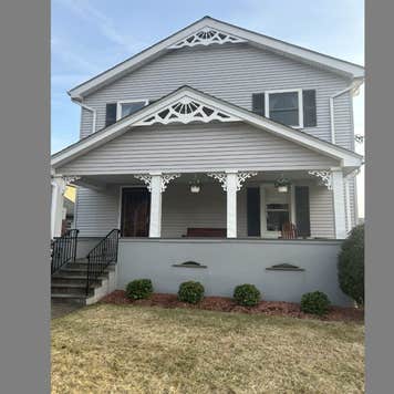 Image of a gray two-story home