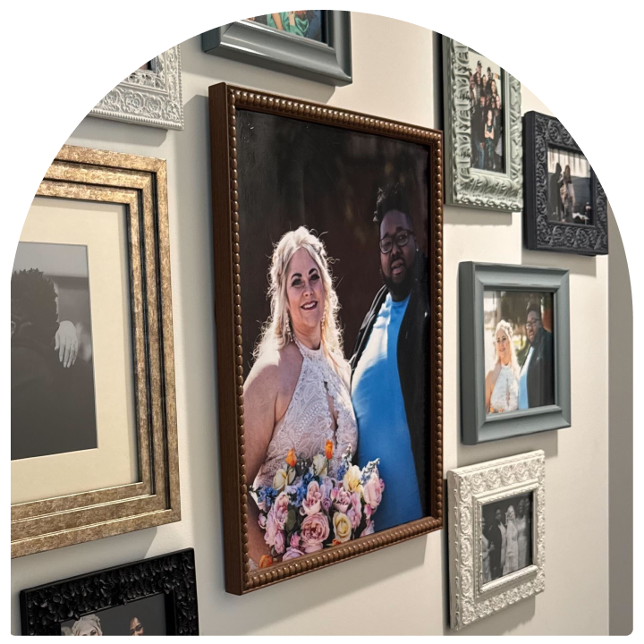 Photos hang on the wall in Chandra's home.