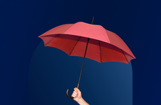 Bankrate awards 2024 life insurance banner featuring a hand holder a red, opened umbrella
